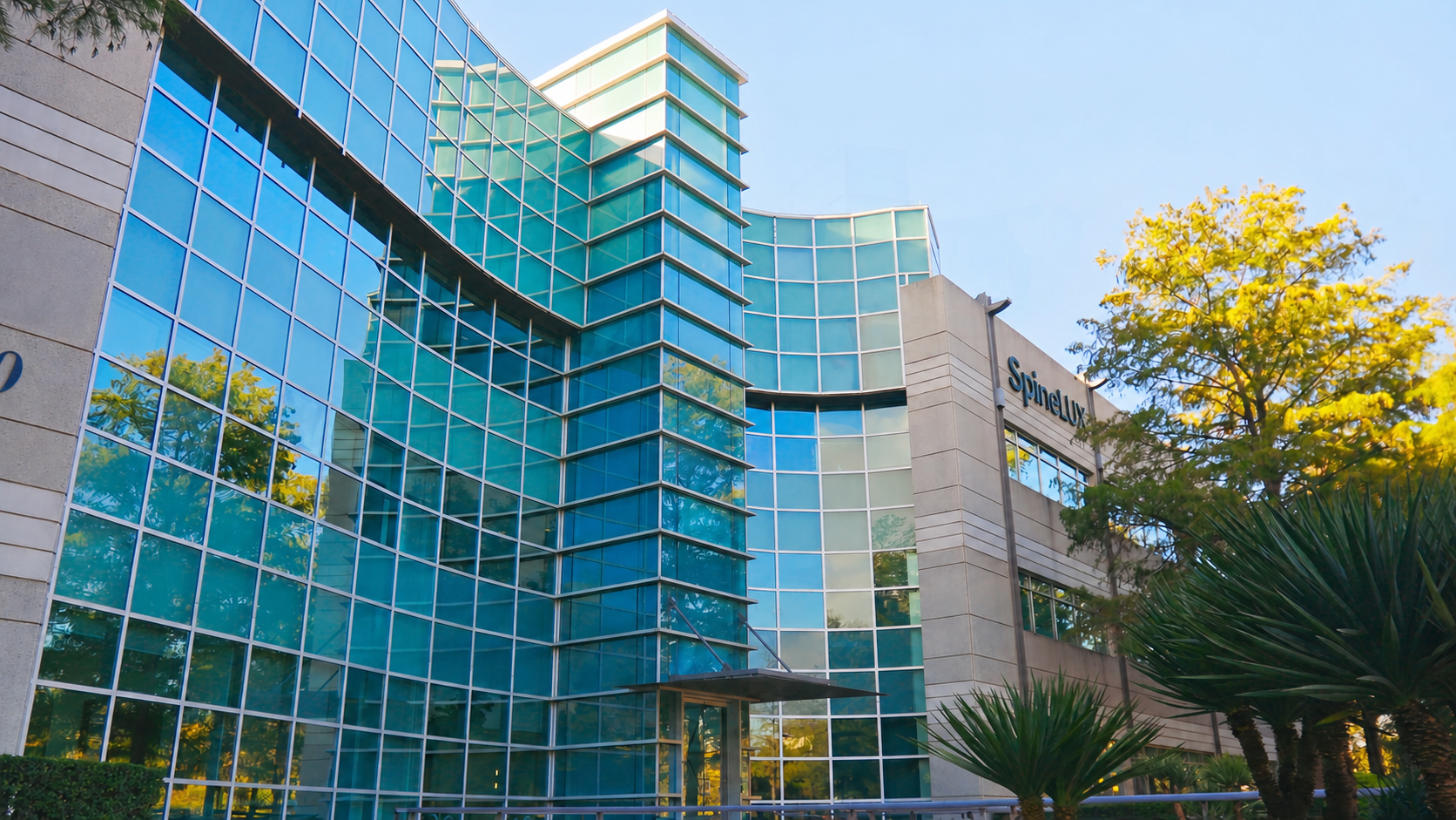 SpineLUX Irving office with exterior SpineLUX building sign